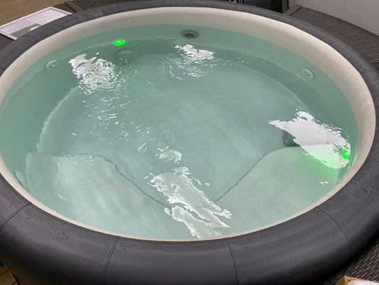 Softub Portico refurbished 5-6 person hot tub showing Pearl interior, hydrotherapy seating and multicoloured LED lighting